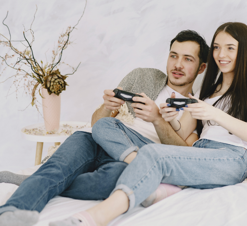 couple playing video game together